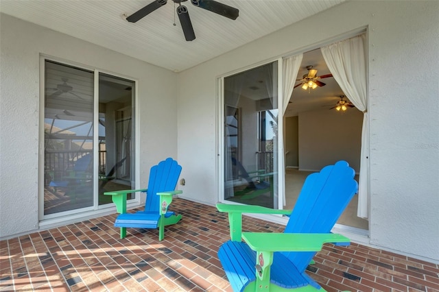 view of patio featuring ceiling fan