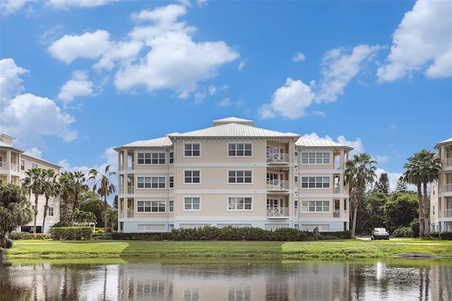 view of building exterior featuring a water view