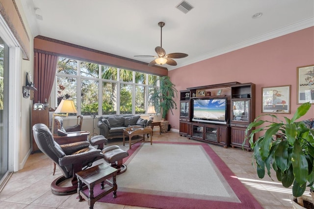 tiled living room with crown molding and ceiling fan