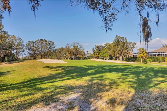 view of home's community featuring a lawn