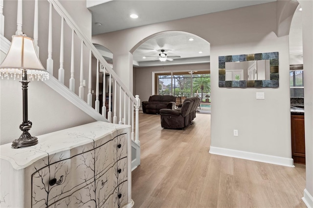 interior space featuring ceiling fan and wood-type flooring