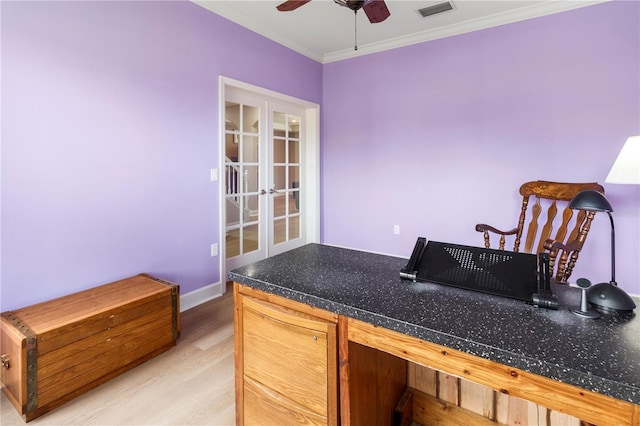 office space featuring ceiling fan, crown molding, light hardwood / wood-style floors, and french doors