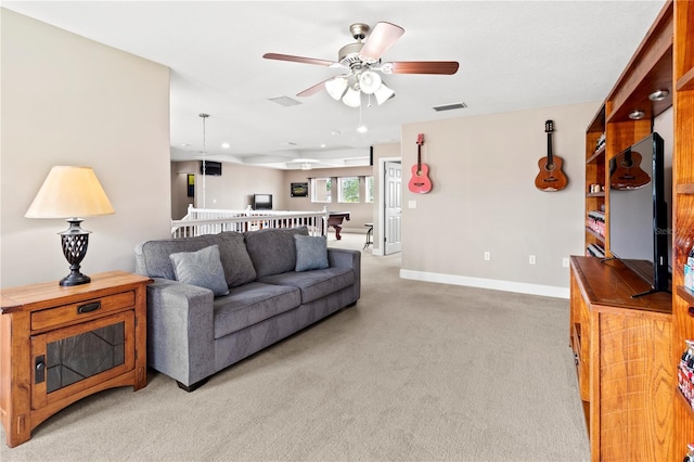 carpeted living room with ceiling fan and billiards