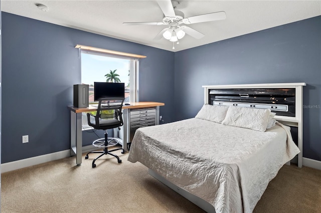 bedroom featuring ceiling fan and carpet floors