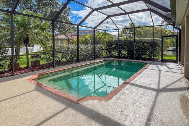 view of pool featuring a patio area and a lanai