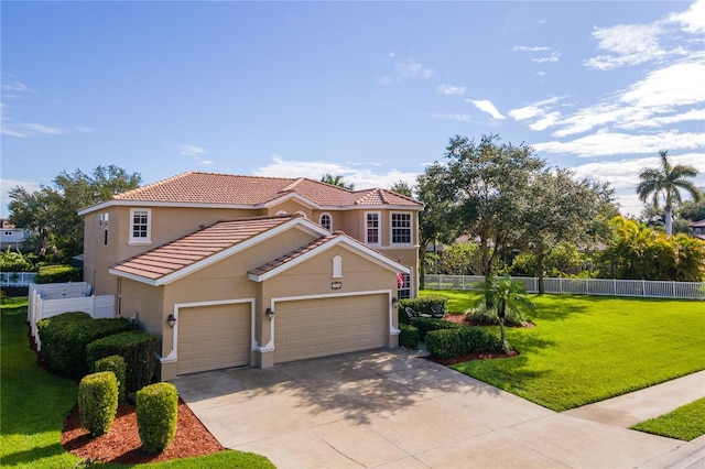 mediterranean / spanish-style house featuring a garage and a front yard