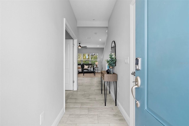 entryway featuring ceiling fan