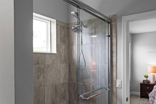 bathroom featuring an enclosed shower