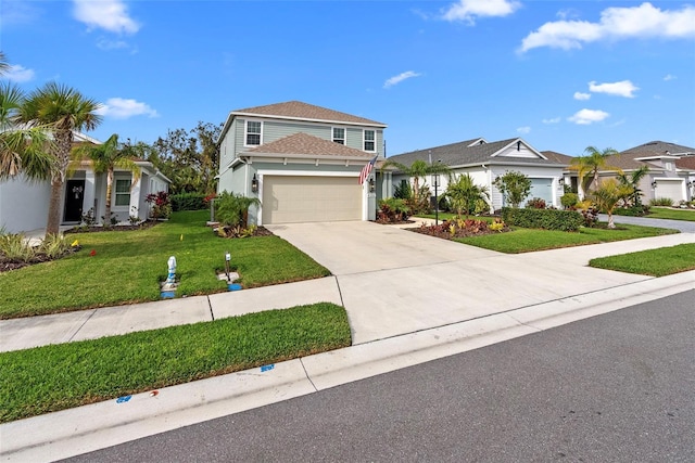 view of front of home featuring a garage and a front yard