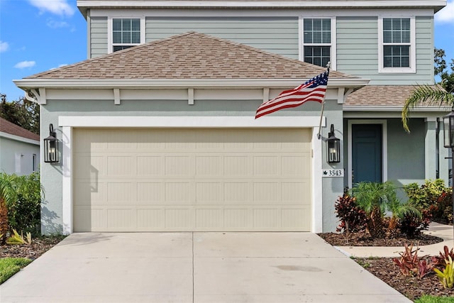 front of property featuring a garage