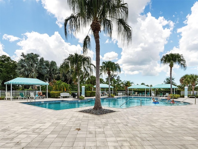 view of pool featuring a gazebo and a patio