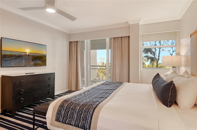 bedroom featuring ceiling fan, crown molding, and multiple windows