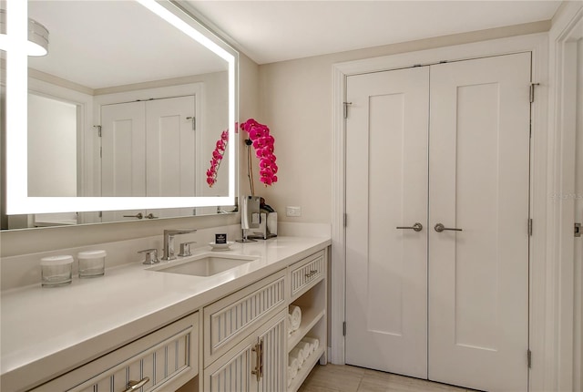 bathroom featuring vanity and tile patterned flooring