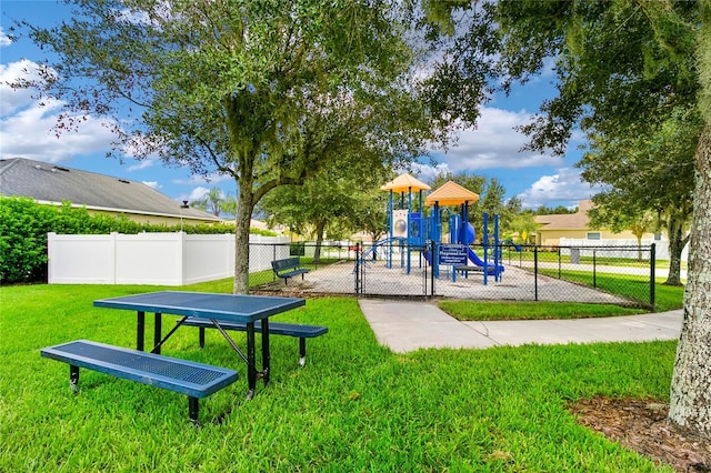 view of play area featuring a lawn