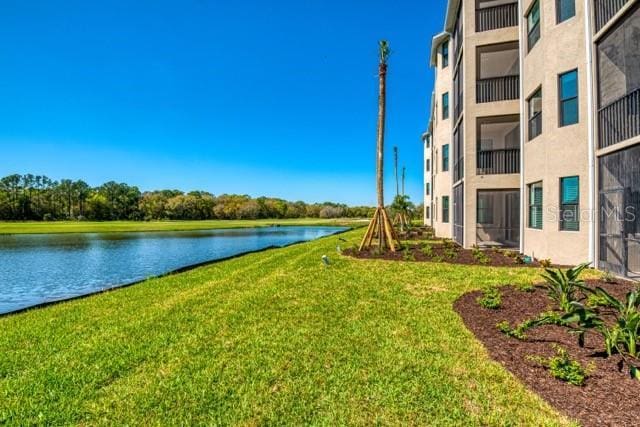 view of yard with a water view