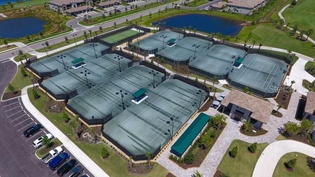 birds eye view of property featuring a water view