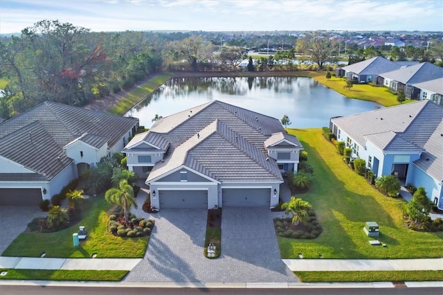 drone / aerial view featuring a water view