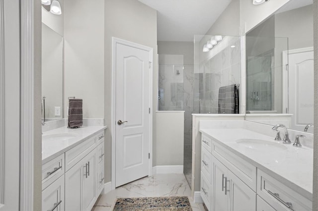 bathroom featuring a shower and vanity