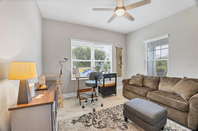 office area with ceiling fan and plenty of natural light