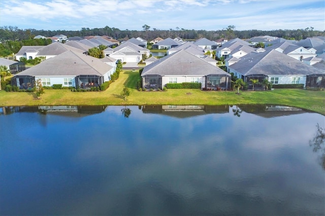 drone / aerial view with a water view