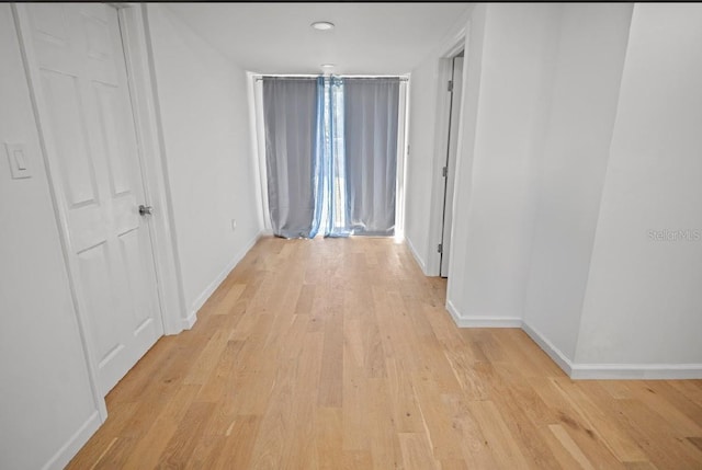 hallway featuring light hardwood / wood-style flooring