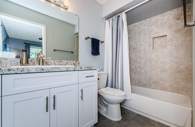 full bathroom featuring toilet, vanity, and shower / bath combo