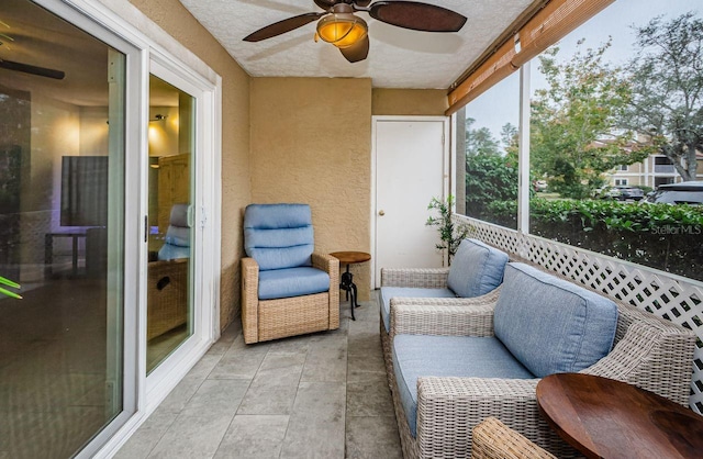 sunroom / solarium with ceiling fan