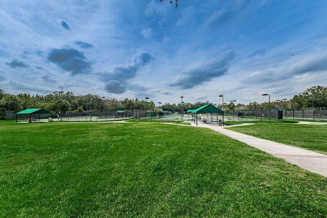 view of home's community with a gazebo and a yard