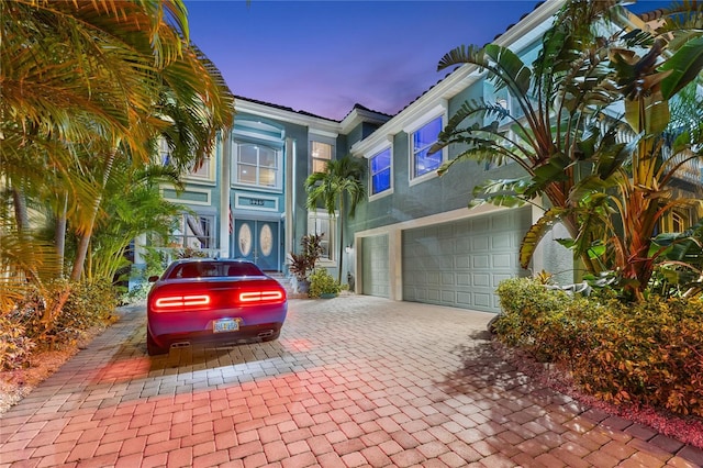 view of front of home with a garage