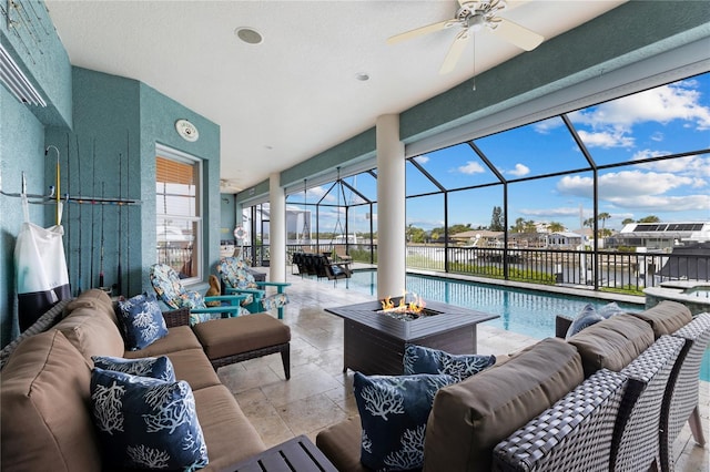 interior space with ceiling fan