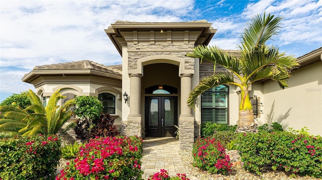 doorway to property with french doors