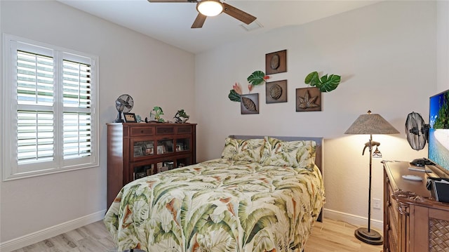 bedroom featuring ceiling fan and light hardwood / wood-style floors