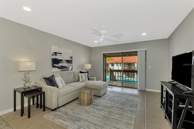 tiled living room featuring ceiling fan