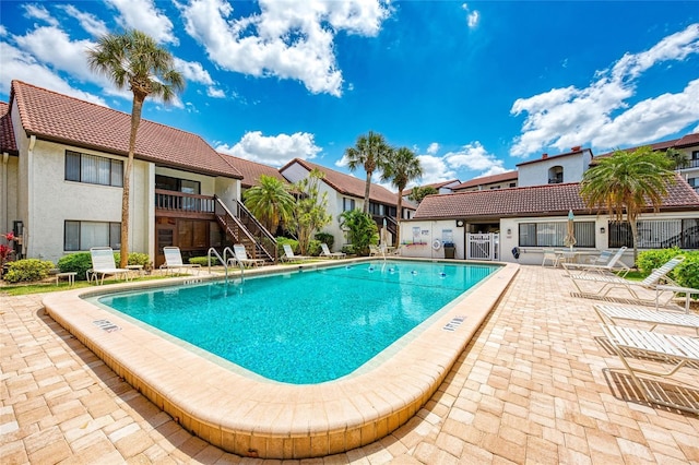 view of pool featuring a patio area