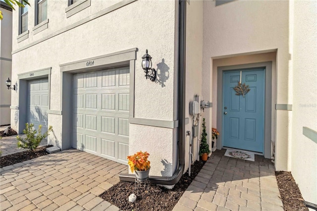 property entrance featuring a garage