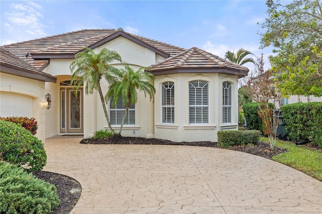 view of front of home with a garage