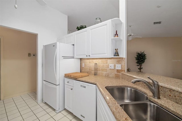 kitchen featuring ceiling fan, backsplash, sink, white appliances, and white cabinets