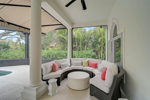 exterior space with ceiling fan and ornate columns