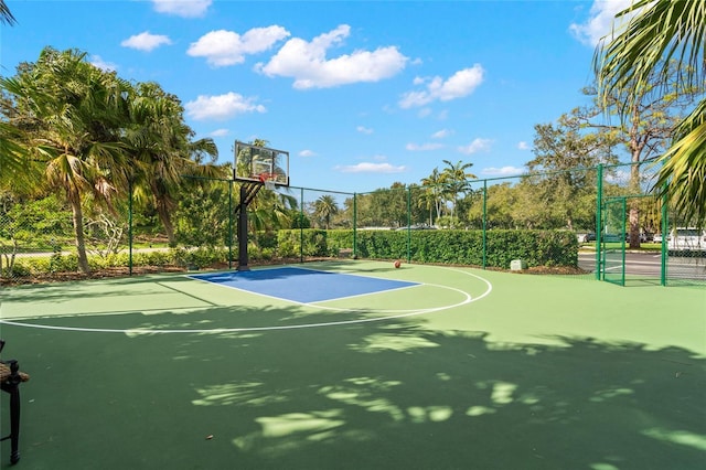 view of sport court featuring community basketball court and fence