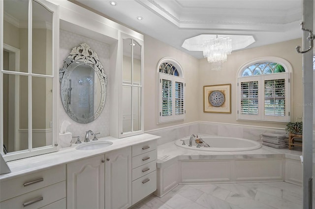 full bathroom with vanity, a bath, marble finish floor, and a chandelier