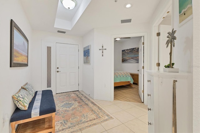 entrance foyer with light tile patterned floors