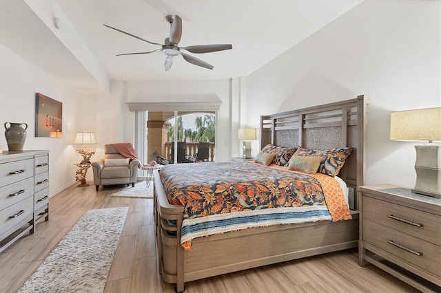 bedroom with access to outside, ceiling fan, and light hardwood / wood-style floors