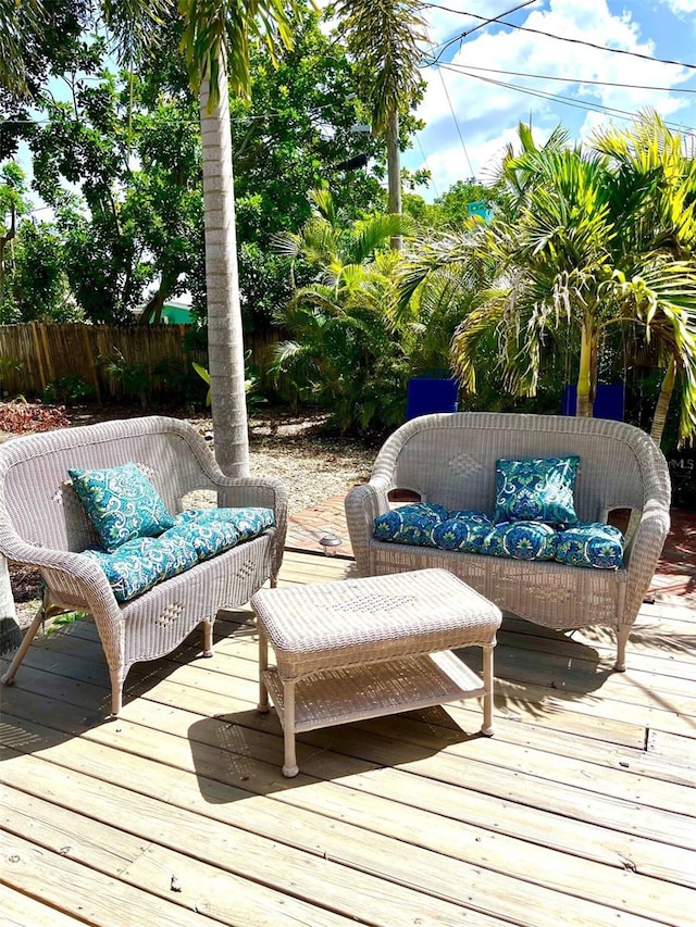 wooden deck featuring outdoor lounge area