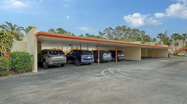 view of car parking featuring a carport