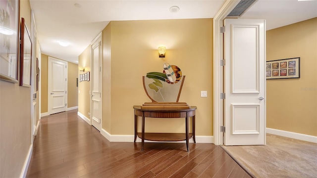 hall featuring wood-type flooring