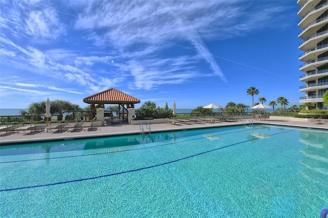 view of swimming pool with a gazebo