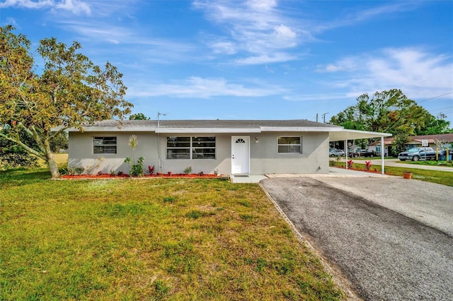 single story home with a carport and a front yard