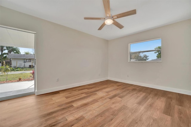 unfurnished room featuring ceiling fan and light hardwood / wood-style floors