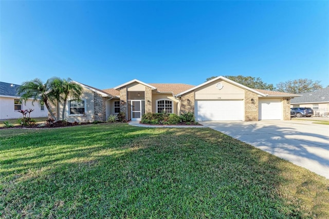 single story home with a front yard and a garage