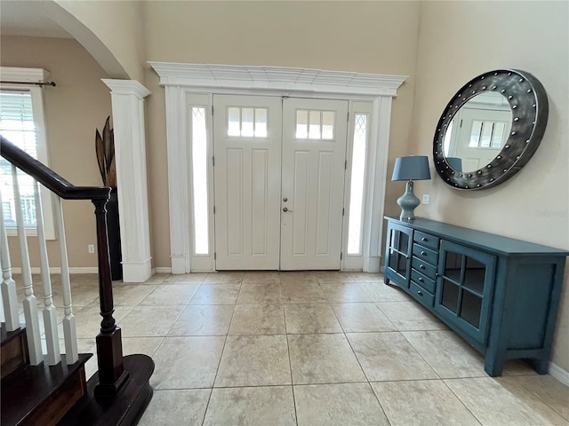 entryway featuring light tile patterned flooring